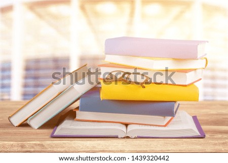 Books on  table  background,close up