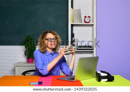 Female university student. Knowledge day. Student and tutoring education concept. Friendly teacher in classroom near blackboard desk. Teacher is skilled leader. Education and learning people concept.