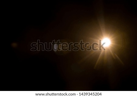 Abstract Natural Sun flare on the black