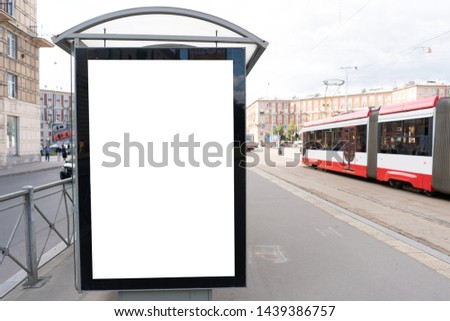 vertical advertising billboard small in the tram station shelter