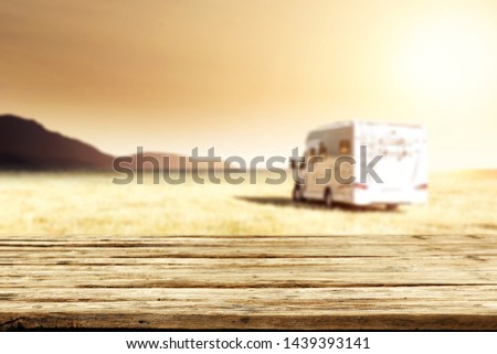 Desk of free space and summer beach background with sea 