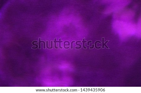 Deep dark violet neon lights watercolor on black background. Paper textured aquarelle canvas for creative design with scratches. Abstract cosmic purple ink texture water color paint illustration