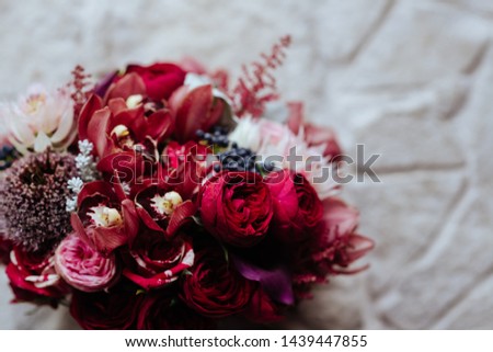 Pink rose flowers bouquet on light stone background
