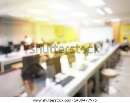 Education concept, Blurred image of the student learning technology and workshop using computer together in computer room in secondary, university for study, Network communication and training