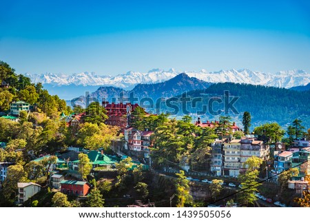 Beautiful panoramic cityscape of Shimla, the state capital of Himachal Pradesh located amidst Himalayas of India. Royalty-Free Stock Photo #1439505056