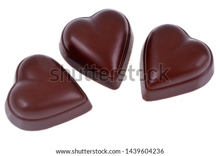 Chocolate hearts in closeup on white background