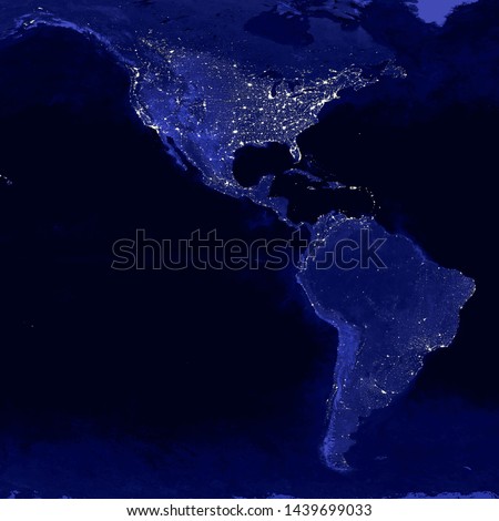 North and South America lights map at night. View from outer space. Elements of this image are furnished by NASA Royalty-Free Stock Photo #1439699033