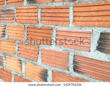Orange brick walls and cement