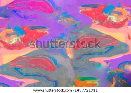 Multicolored background with fingerprints made from plasticine. Play Clay texture.