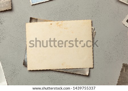 Old photo, blank template for picture, mock-up. Gray background Royalty-Free Stock Photo #1439755337