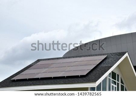 Solar energy system on the roof of a house with sky background at Bangkok, Thailand.