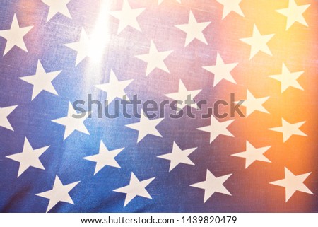 Closeup view of stars on blue background as fragment of United States of America flag. Greeting card to celebrating Independence day USA or Memorial, Labor day. Happy national flag day concept