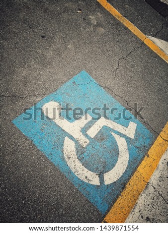 Image of a disabled person empty parking space.