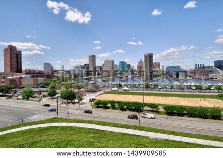 High angle, scenic view of Baltimore City and the Inner Harbor on a summer day in Maryland.