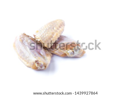 The picture of raw chicken wings isolated on white background