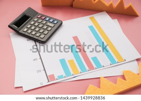 Statistic graphic with calculator on flat color background