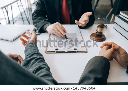 smart lawyer review and give advice to clients in the office before considering the judgment, lawyer concept
 Royalty-Free Stock Photo #1439948504