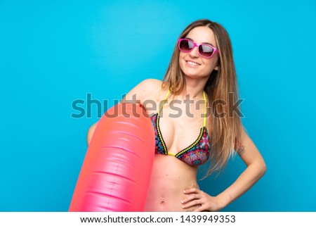 Young woman in bikini in summer holidays