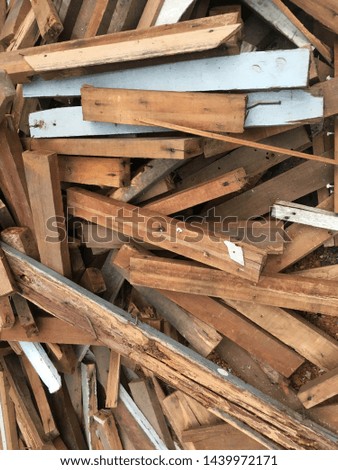 The old logs from the house demolition