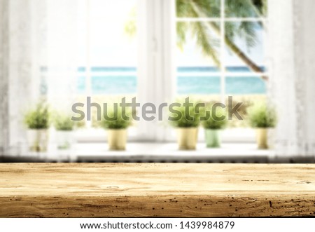 Desk of free space and summer background of window 