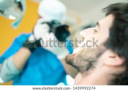 Photograph of dental teeth on a patient in the armchair