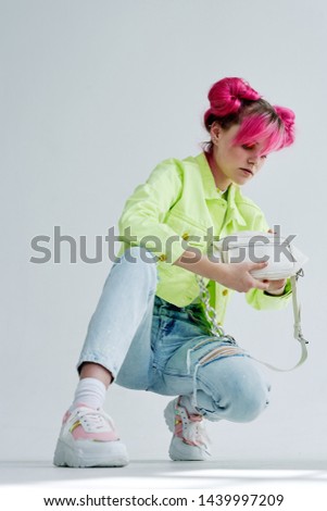 woman with pink hair in stylish clothes the nineties retro