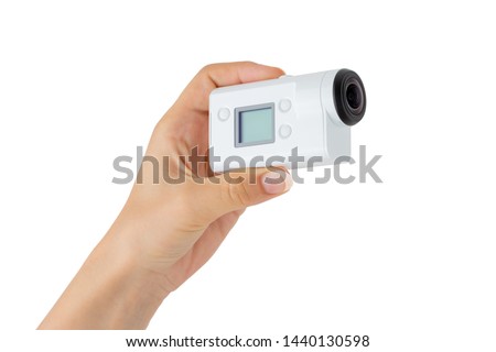 Portable video camera on a white background. Action camera close up.