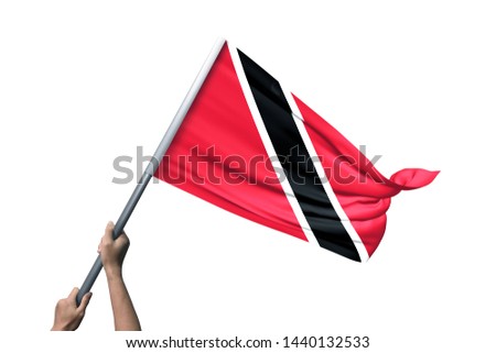 Young man holding Trinidad and Tobago Flag in White Background, Flag of Trinidad and Tobago.