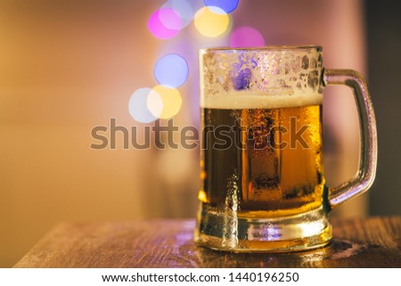 glass of beer and bokeh