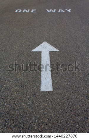One way sign on the road