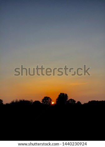 The sunset bring peace to nature Royalty-Free Stock Photo #1440230924