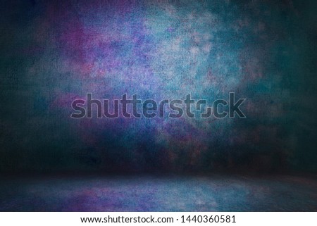 blue photo multicolored backdrop grunge, studio background for photos wall and floor lit by lamps. Studio Portrait Backdrops Photo