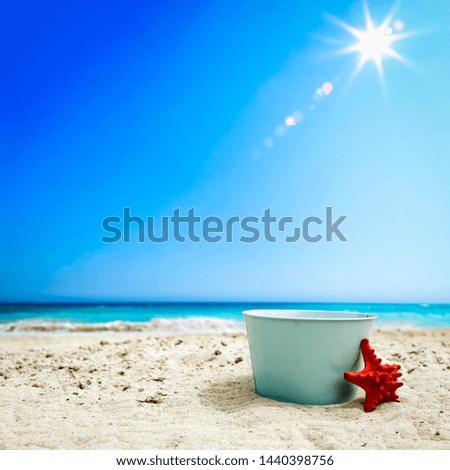 Summer background of beach with ocean and blue sky. Free space for your decoration and summer time. 
