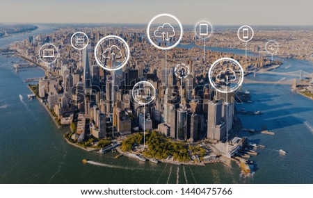 Cloud computing with aerial view of Manhattan, NY skyline