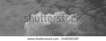 Black sky with white clouds. Beautiful sky background and wallpaper. 