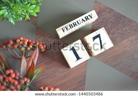 Date of February month. Diamond wood table for background.
