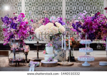 Wedding flowers in a vase placed on the table Royalty-Free Stock Photo #1440510332