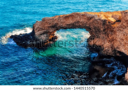 Lovers Bridge a famous natural stone bridge, a popular spot for taking photos in Ayia Napa, Cyprus. 