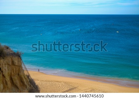 Blurry picture of the beach in Albufeira, Portugal; Atlantic Ocean