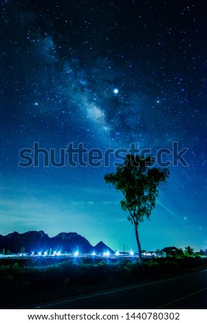 Milky way galaxy with stars and space in the universe background at thailand with noise in the photo