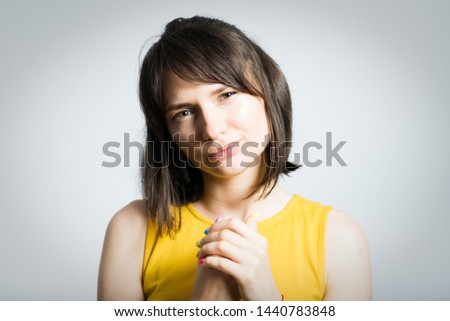 beautiful young woman cunning, isolated on background