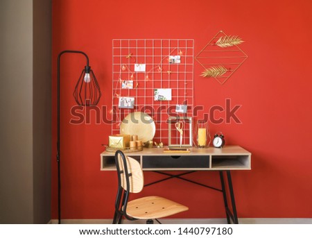 Workplace with mood board in modern room