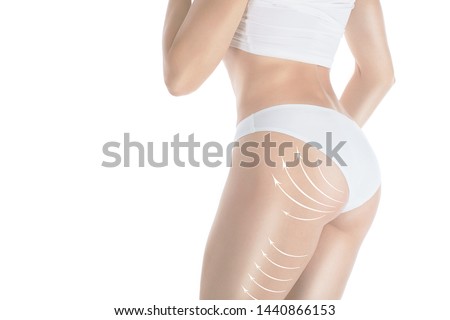 Female attractive body and butt in base underwear. Lifting marking with arrows in womans bum and hips, isolated on white. Plastic surgery, buttock augmentation, dieting, wellness, health, medicine