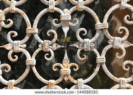 abstract decorative metal protection for windows Royalty-Free Stock Photo #144088585
