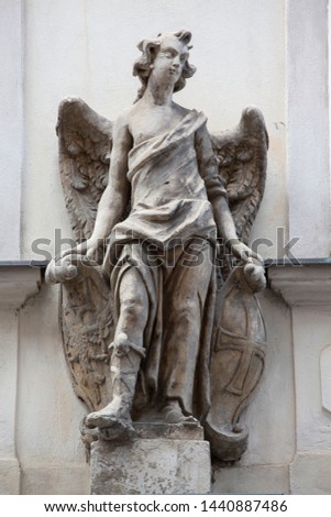 angel sculpture and decoration on building in vienna