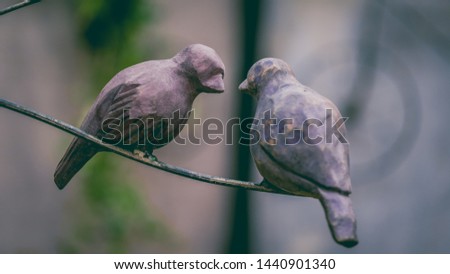 Artificial Bird On Tree Branch