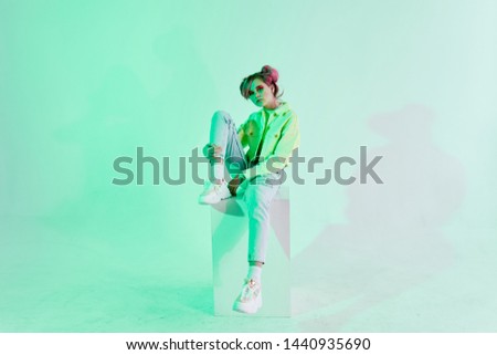 woman with pink hair in green jacket style