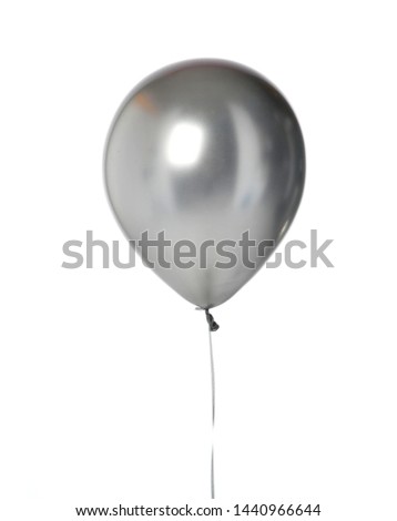 Big silver metallic latex balloon for birthday party isolated on a white background