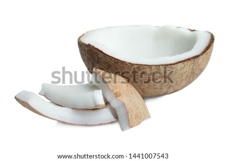 Slices of broken exotic coconut isolated on white.