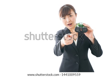 Young business woman looking closer